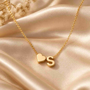 Personalized Heart Initial Necklace in gold with heart charm and initial S on a delicate chain
