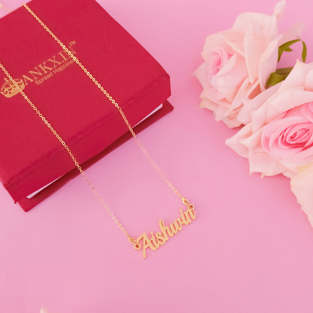 Personalized name necklace combo in gold featuring the name Aishani on a delicate chain