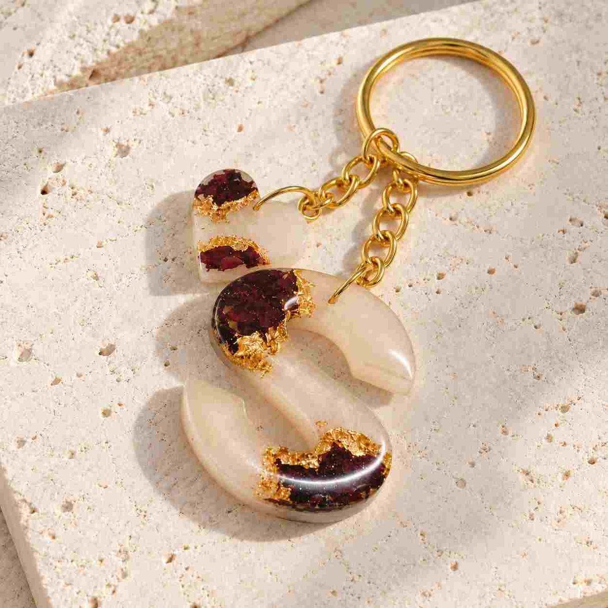 Personalized Resin Letter Keychain in Beige and Brown with Gold Accents featuring an 'S' Design