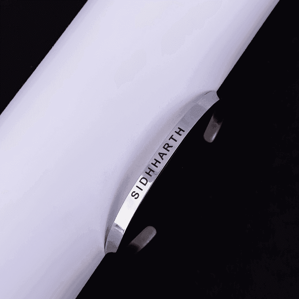 Personalized Silver Name Bracelet engraved with Sidhharth on a premium black and white background.